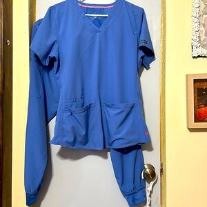 Med couture scrubs, pants size medium and top size large